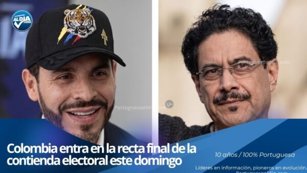 Ciudadanos colombianos ejerciendo su derecho al sufragio en las mesas de votación durante los comicios presidenciales.