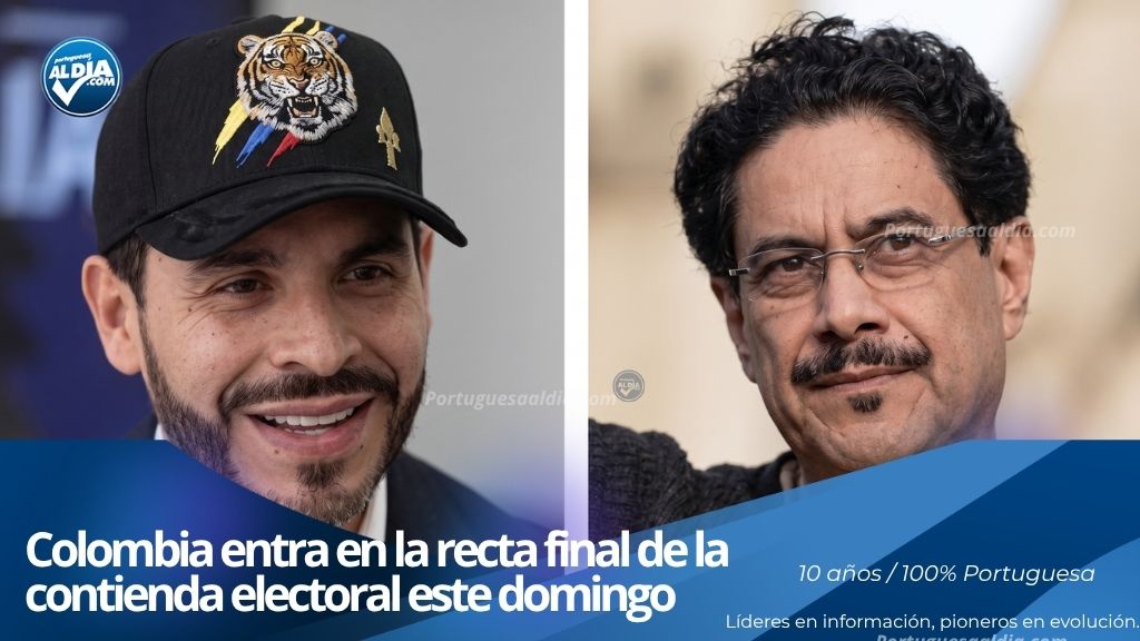 Ciudadanos colombianos ejerciendo su derecho al sufragio en las mesas de votación durante los comicios presidenciales.