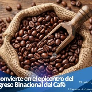 Productores y especialistas analizando granos de café durante el encuentro binacional en Caracas.